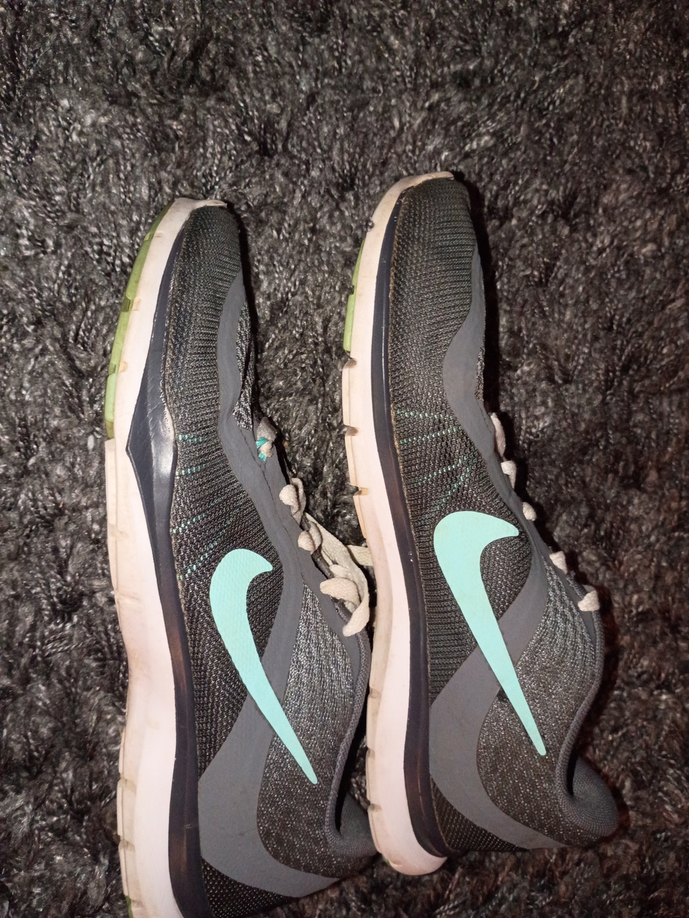 Nike Women's Gray Running Sneakers with Teal Swoosh